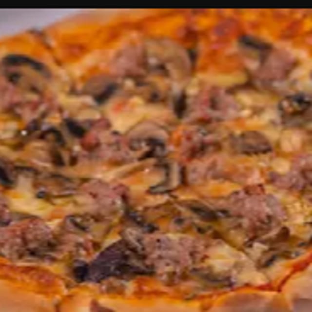 Funghi E Salsiccia Pizza.